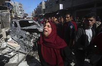 A Palestinian woman reacts after an Israeli strike on Shaheen family house in Rafah, Gaza Strip, Feb. 24, 2024.