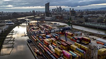 Containers are pictured in the small harbour in Frankfurt, Germany, Tuesday, Feb. 13, 2024.