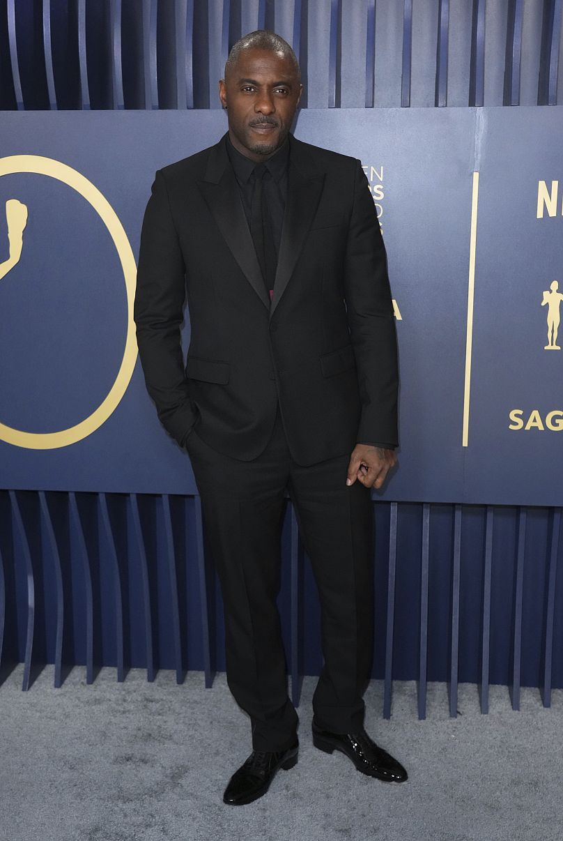 English actor Idris Elba looking sleek in an all-black suit at the 30th annual SAG Awards in Los Angeles.