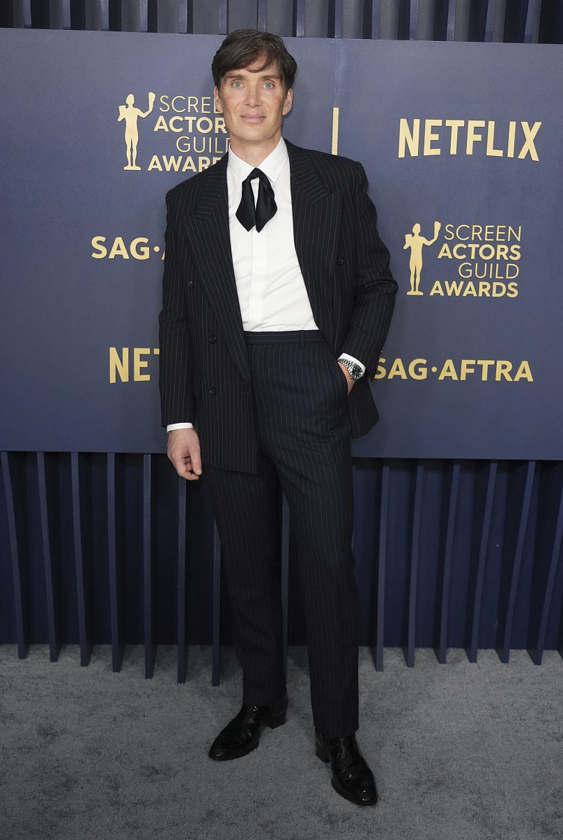 Cillian Murphy went for a modern look with a Saint Laurent pinstripe suit at the 30th annual SAG Awards in Los Angeles.