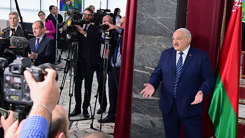 Belarus President Alexander Lukashenko addresses the media after voting, at a polling station in Minsk, Belarus, on Sunday, Feb. 25, 2024.