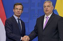 Sweden's Prime Minister Ulf Kristersson, left, shakes hands with his Hungarian counterpart Viktor Orban at the Carmelite Monastery in Budapest, Hungary, Feb 23, 2024. 