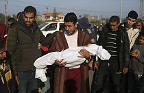 Palestinian Abdul Rahman Sharif holds the body of his four-year-old son Abdul Rahman Muamm, killed in the Israeli bombardment of the Gaza Strip, Feb. 26, 2024.