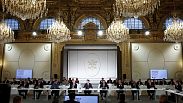 French President Emmanuel Macron, center, delivers a speech at the Elysee Palace in Paris, Monday, Feb. 26, 2024.