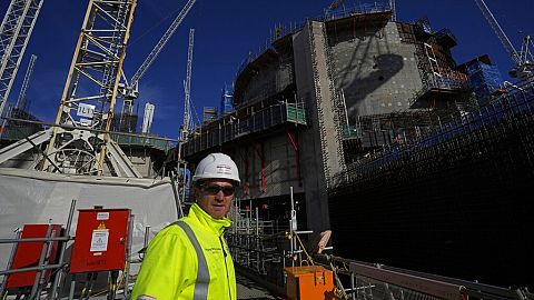 An employee works at the construction site of Hinkley Point C nuclear power station in Somerset