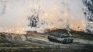 FILE - A Leopard 2 tank is seen in action in Augustdorf, Germany, Feb. 1, 2023. 