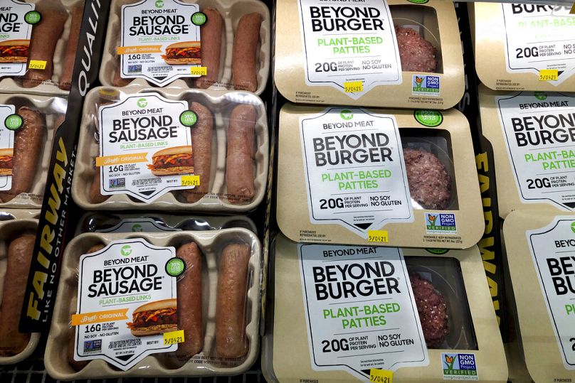 Packages of Beyond Meat's Beyond Burgers and Beyond Sausage, are shown in this photo, in New York, on 29 April 2021.