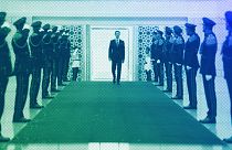 Bashar Assad, reviews an honor guard at the Syrian Presidential Palace in the capital Damascus, July 2021