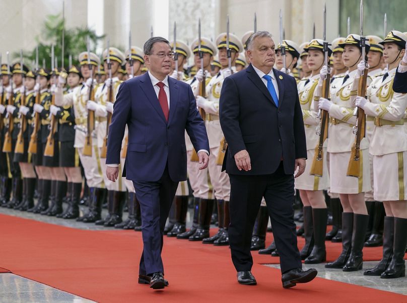 Hungarian Prime Minister Viktor Orban and his Chinese counterpart Li Qiang during a welcome ceremony at the Great Hall of the People in Beijing, October 2023