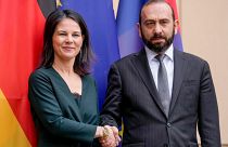 German Foreign Minister Annalena Baerbock, left, welcomes Armenia's Foreign Minister Ararat Mirzoyan for peace talks in Berlin, Germany, Wednesday, Feb. 28, 2024.