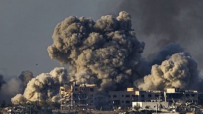 FILE - Smoke rises following an Israeli bombardment in the Gaza Strip, as seen from southern Israel, Saturday, Dec. 16, 2023. 