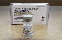 FILE - Comirnaty, a new Pfizer/BioNTech vaccination booster for COVID-19, is displayed at a pharmacy.