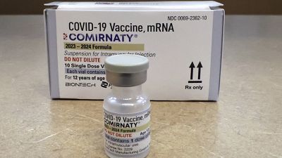 FILE - Comirnaty, a new Pfizer/BioNTech vaccination booster for COVID-19, is displayed at a pharmacy.
