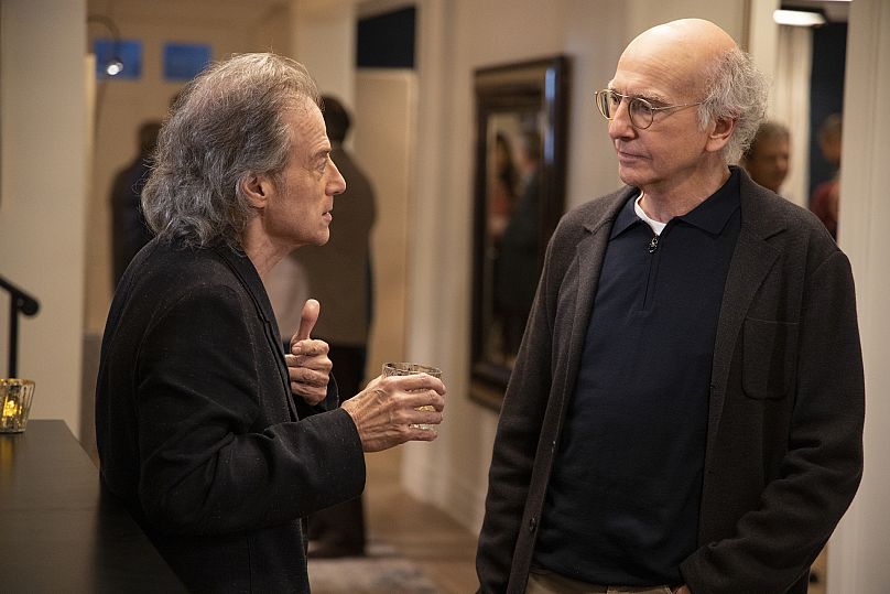 Richard Lewis, left, with Larry David in a scene from Season 10 of "Curb Your Enthusiasm."