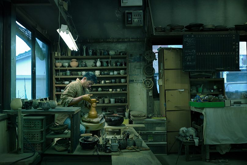 Ceramics artist Yusuke Onimaru at his kiln in his home in Fukuoka, Japan.
