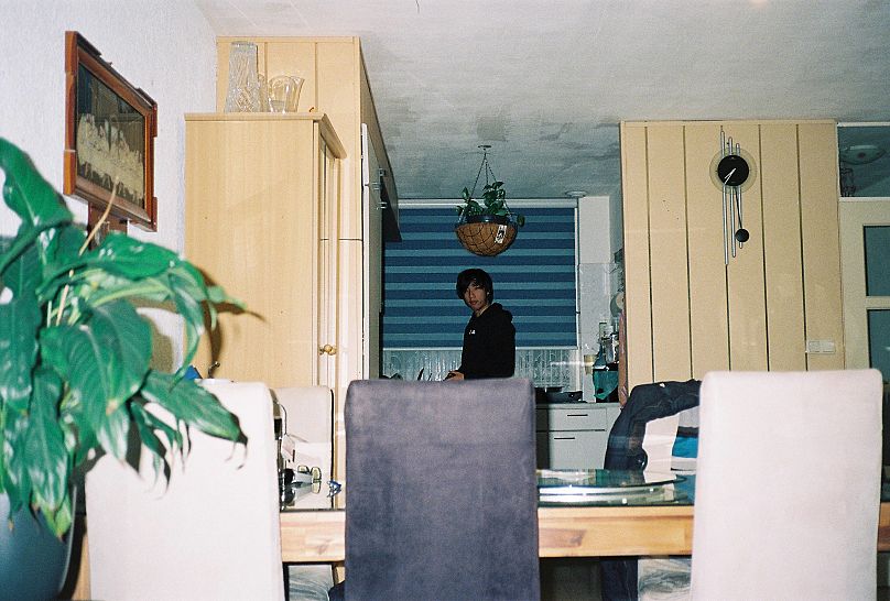 Trâm Nguyen Quang's brother in her family home in Amsterdam.