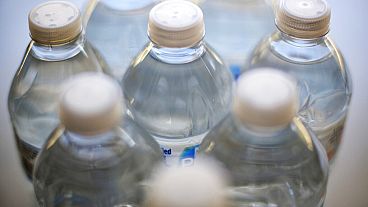 FILE- bottles of drinking water