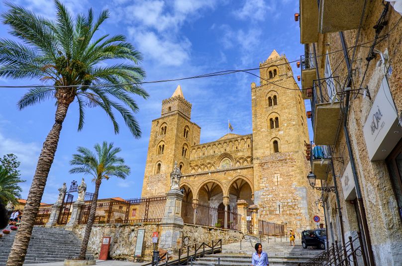 The coastal town of Cefalù in northern Sicily is designated as one of the most beautiful villages in Italy and is renowned for its fortress-like Norman cathedral.
