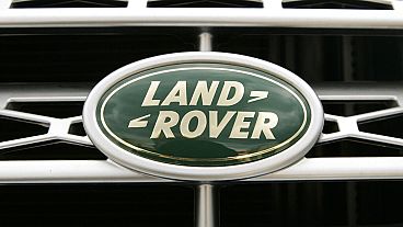 The logo on the grill of a Land Rover vehicle appears in the parking lot of a dealership, in Norwood, Mass., Wednesday, March 26, 2008. 