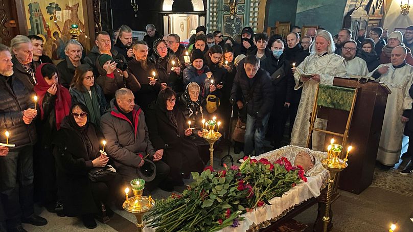 Relatives and friends pay their last respects at the coffin of Russian opposition leader Alexei Navalny in the Church of the Icon of the Mother of God Soothe My Sorrows.