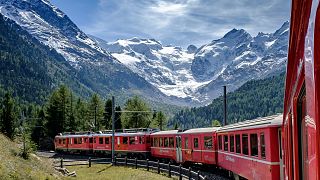 The Bernina Express passes by the stunning Morteratsch Glacier in Switzerland