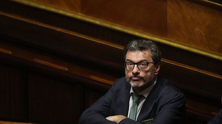 Italian Finance Minister Giancarlo Giorgetti waits for the start of a confidence vote for the new Government, in Rome, Wednesday, Oct. 26, 2022. 