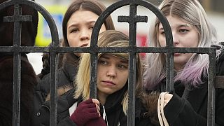 People gather outside the Church of the Icon of the Mother of God Soothe My Sorrows, in Moscow, Russia, Friday, March 1, 2024.