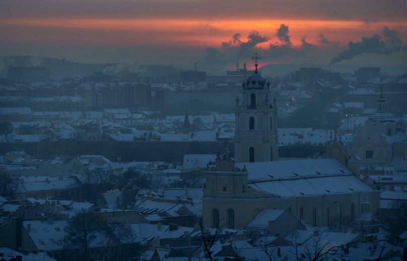 A view of the snow covered Vilnius as the sun sets, Lithuania, Monday, Jan. 4, 2016. The air temperature was -19 degrees Celsius.
