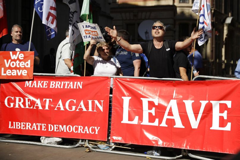Brexit supporters protest outside the Supreme Court in London, Tuesday Sept. 17, 2019.