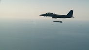 Un avion de combat F-15K de l'armée de l'air sud-coréenne largue un missile Taurus lors d'un exercice, le mercredi 13 septembre 2017.