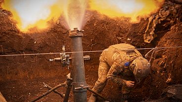 Ukrainian servicemen of the 28th Separate Mechanised Brigade fires a 122mm mortar towards Russian positions at the front line, near Bakhmut, Donetsk region, Ukraine, 3/4/24.