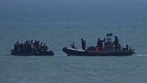 A British Border Force patrol boat intercepts a rib with people thought to be migrants off the the coast at Dungeness, England, Thursday, Sept. 16, 2021. 