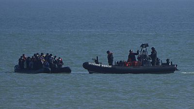A British Border Force patrol boat intercepts a rib with people thought to be migrants off the the coast at Dungeness, England, Thursday, Sept. 16, 2021. 