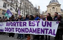 Pro-abortion rights activists attend a rally outside La Sorbonne university in Paris.