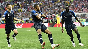 France's Kylian Mbappé celebrates after scoring his side's fourth goal during the final match between France and Croatia at the World Cup in Moscow, Russia, 15 July 2018