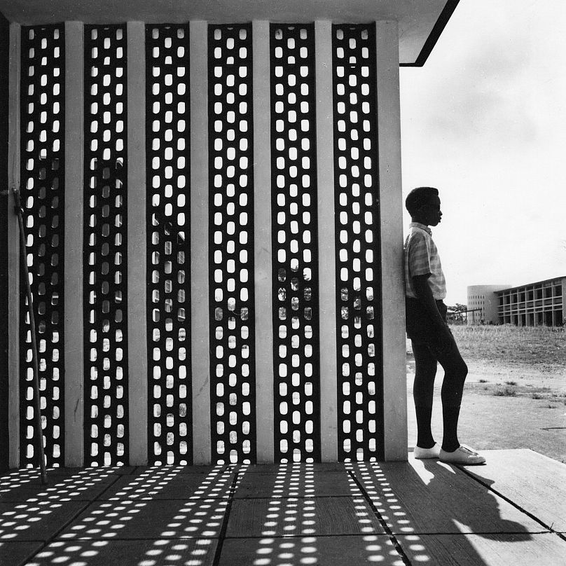 Boy and concrete screen at University College Ibadan, 1962.