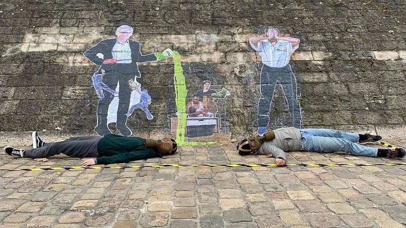 The activists also painted a fresco on the banks of the Rhône in central Lyon, depicting an Arkema representative pouring PFAS into the water of a nursing mother.