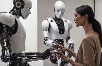 AI generated image showing interaction between a human being and a humanoid robot