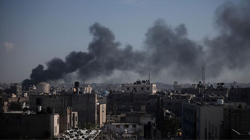 Smoke rises after an Israeli strike in Khan Younis, Gaza Strip, 6 January 2024.