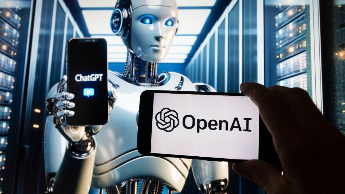 The OpenAI logo is seen displayed on a cell phone with an image on a computer screen generated by ChatGPT's Dall-E text-to-image model, Friday, Dec. 8, 2023, in Boston.