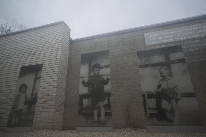Portraits of Henriette Bolle, Jacob Vischjager, and Abraham Prins, victims of Nazi atrocities in WWII, displayed at Amsterdam's new National Holocaust Museum.