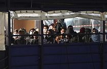 Flüchtlinge auf einem Schiff.