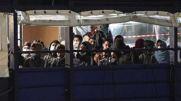 Flüchtlinge auf einem Schiff.
