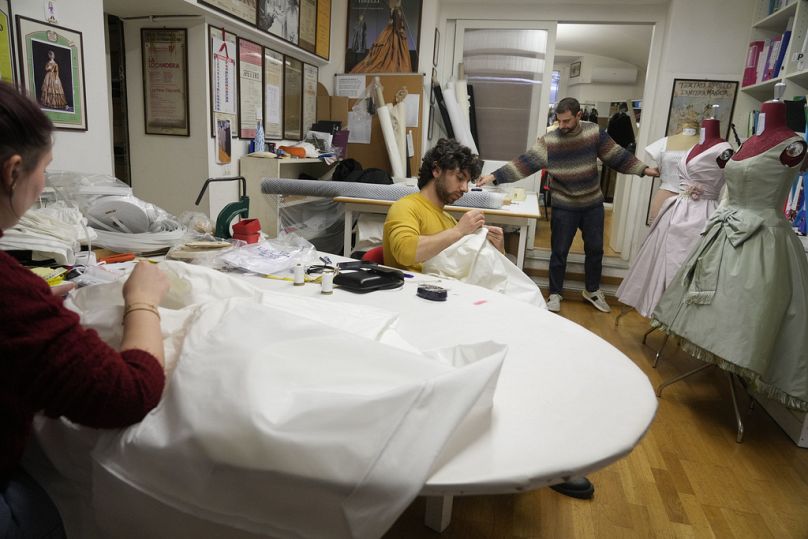 Dressmakers work at the Tirelli Atelier in Rome, Tuesday, March 5, 2024.