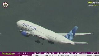 In this image taken from video provided by Cali Planes, a United Airlines Boeing 777 bound for Japan loses a tire as it takes off from San Francisco, Thursday, March 7, 2024.