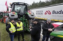 Polish farmers block a major road with tractors during a protest in Lomianki, near Warsaw, Poland, on Wednesday, March 6, 2024. 