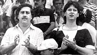  the late Pablo Escobar, former boss of the Medellin drug cartel, his wife Maria Henao and their son Juan Pablo, attend a soccer match in Bogota, Colombia