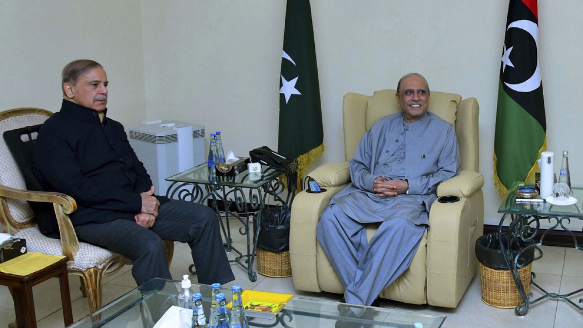Prime Minister Shehbaz Sharif, left, meets with newly elected Pakistan's President Asif Ali Zardari, in Islamabad, Pakistan, Saturday, March 9, 2023.