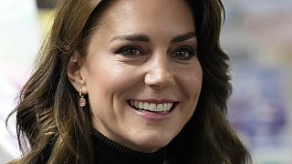 Kate, Princess of Wales smiles as she speaks to a woman during her visit to Sebby's Corner in north London on Nov. 24, 2023. 