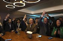 Populist right wing Chega supporters react during the announcement of the first electoral results at their party headquarter in Lisbon, Sunday, March 10, 2024.